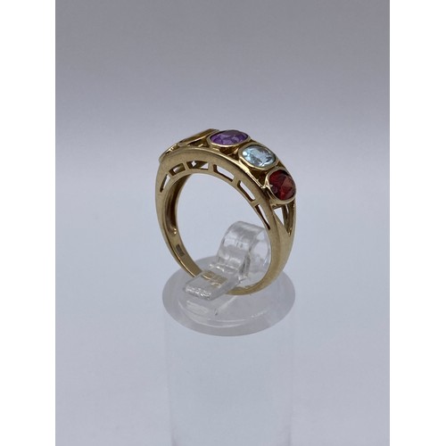 291 - 9CT GOLD MULTI STONE CHANNEL SET RING 3.5G APPROX