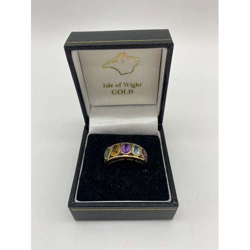 291 - 9CT GOLD MULTI STONE CHANNEL SET RING 3.5G APPROX