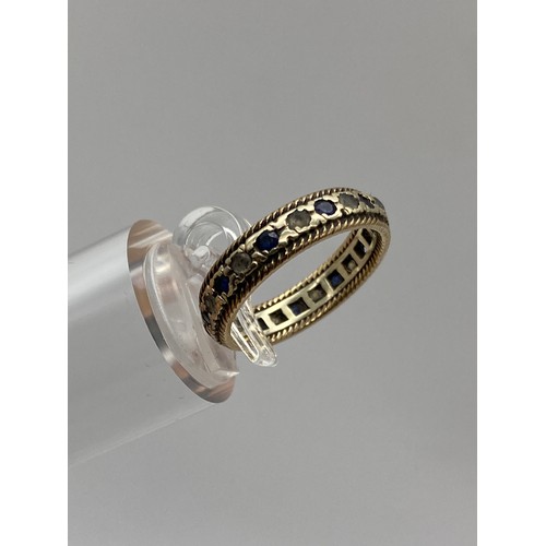 293 - 9CT GOLD ROPE EDGED ETERNITY BAND