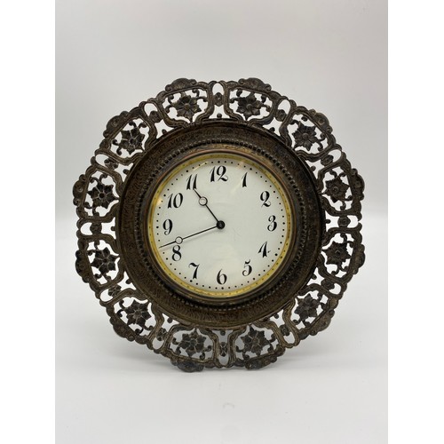 303 - EASEL BACKED FILIGREE METALWORK FRAMED MANTEL TIMEPIECE