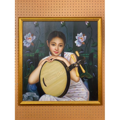 368 - 20TH CENTURY OIL ON CANVAS OF A CHINESE GIRL WITH YUEQIN AMIDST LOTUS FLOWERS IN GILT FRAME