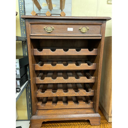 104 - OAK AND STAINED WINE BOTTLE STORAGE CABINET