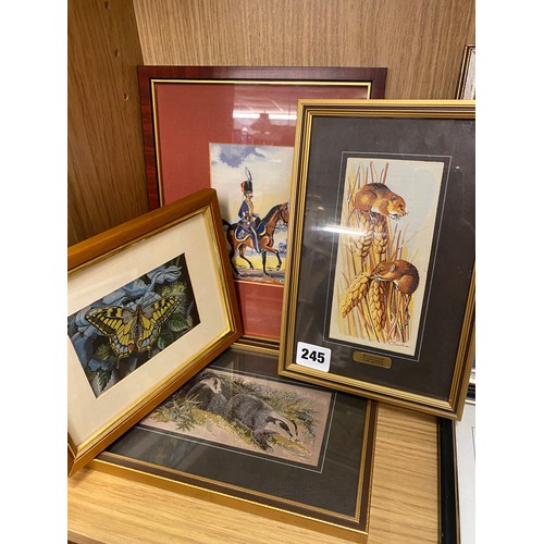 245 - TWO SHELVES OF CASHS WOVEN SILK PICTURES OF BIRDS AND WILD ANIMALS