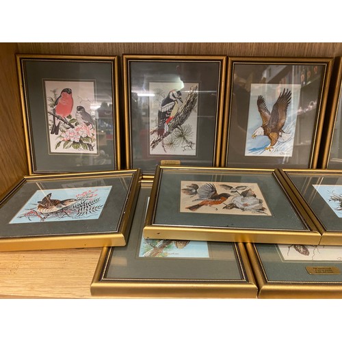 245 - TWO SHELVES OF CASHS WOVEN SILK PICTURES OF BIRDS AND WILD ANIMALS