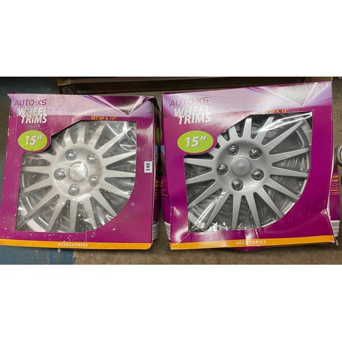 148 - TWO BOXES OF AUTO EXCESS 15INCH WHEEL TRIMS