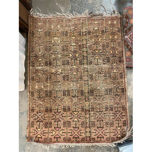 412 - THREE GEOMETRIC AND FLORAL-PATTERNED RUGS 125 X 84CM, 100 X 50CM, AND 85 X 110CM APPROX