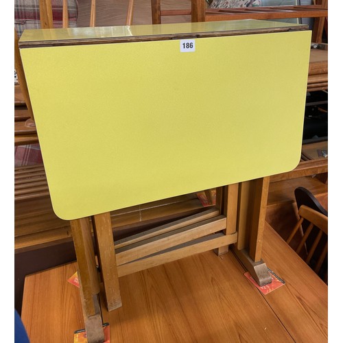 186 - 1960S YELLOW FORMICA DROP FLAP TABLE