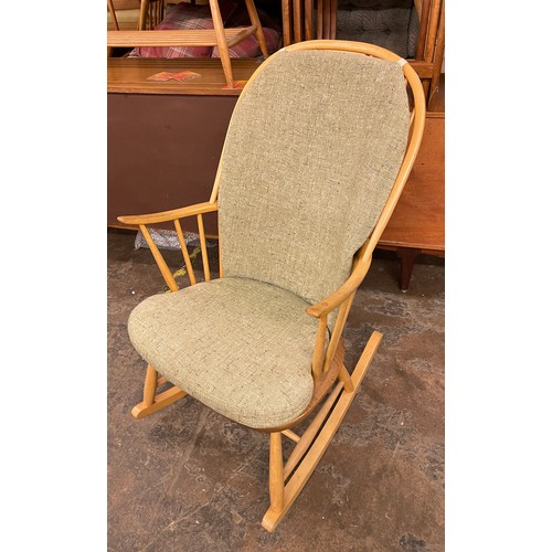 53 - LIGHT ERCOL SPINDLE BACK ROCKING ARMCHAIR