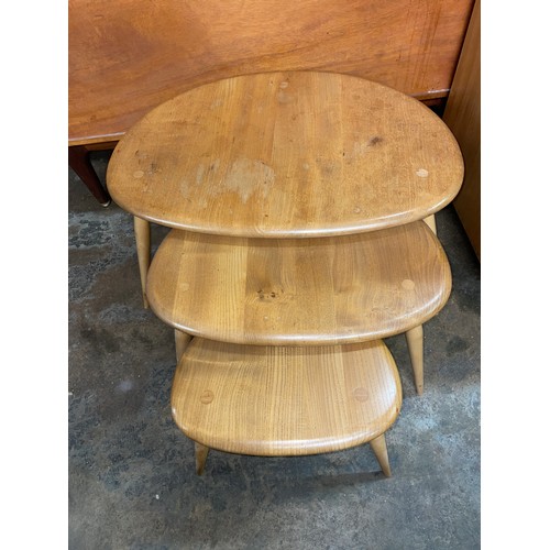 54 - LIGHT ERCOL NEST OF THREE PEBBLE TABLES (NO.354)