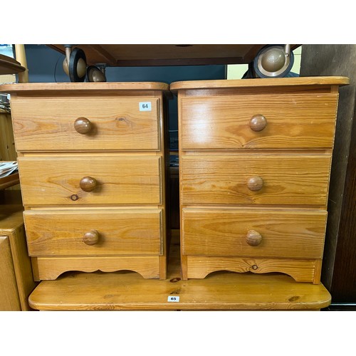 64 - PAIR OF PINE THREE DRAWER BEDSIDE CHESTS