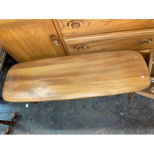 46 - LIGHT WOOD ERCOL STYLE MAGAZINE RACK AND ELONGATED COFFEE TABLE