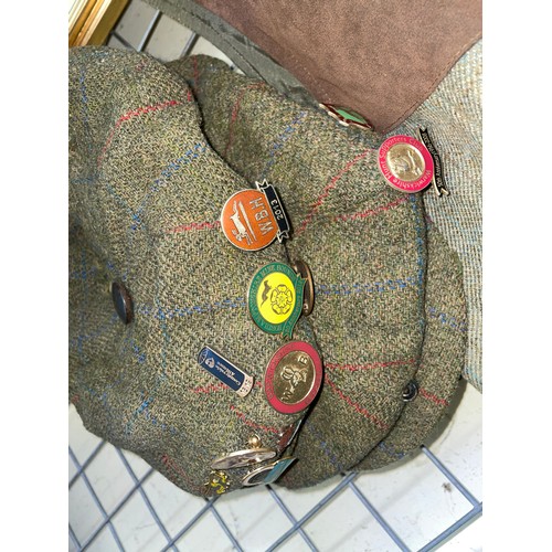 526 - REALLY WILD TWEED GILET AND CAPS WITH VARIOUS ENAMELS BADGES ON