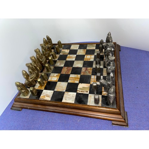 558 - AGATE INSET CHESS BOARD AND CELTIC STYLE CHESSMEN