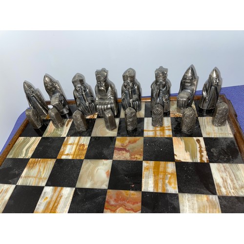 558 - AGATE INSET CHESS BOARD AND CELTIC STYLE CHESSMEN