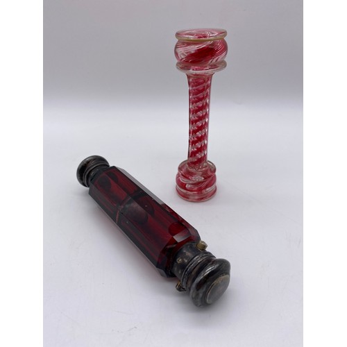 427 - VICTORIAN RUBY GLASS DOUBLE ENDED SCENT BOTTLE AND A RUBY AND OPAQUE TWIST STRETCHER