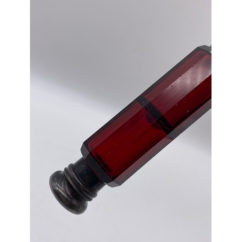 427 - VICTORIAN RUBY GLASS DOUBLE ENDED SCENT BOTTLE AND A RUBY AND OPAQUE TWIST STRETCHER