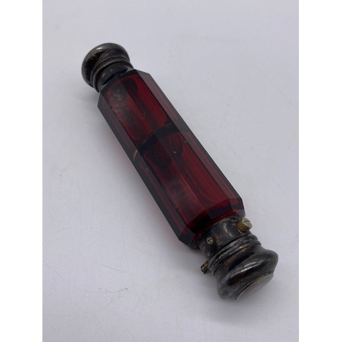 427 - VICTORIAN RUBY GLASS DOUBLE ENDED SCENT BOTTLE AND A RUBY AND OPAQUE TWIST STRETCHER