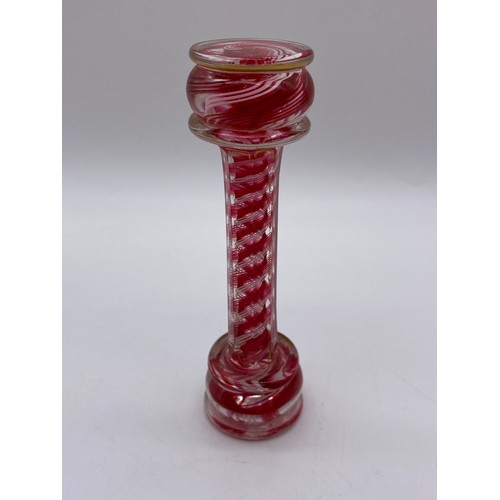 427 - VICTORIAN RUBY GLASS DOUBLE ENDED SCENT BOTTLE AND A RUBY AND OPAQUE TWIST STRETCHER