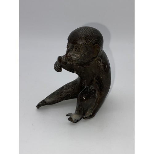 439 - BRONZE OF A SEATED MONKEY