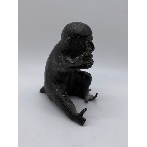 439 - BRONZE OF A SEATED MONKEY