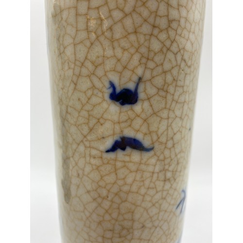 469 - PAIR OF CHINESE CRACKLE GLAZED BLUE AND WHITE SLEEVE VASES DECORATED WITH FIGURES