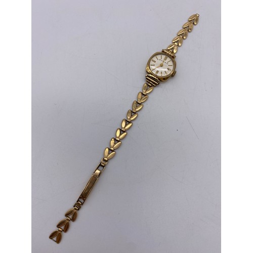 550 - LADIES STRAD 9CT GOLD WRIST WATCH AND LEAF STRAP A/F 12G OVERALL