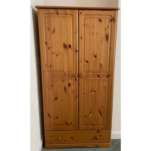 79 - PINE TWO DOOR WARDROBE WITH BASE DRAWER