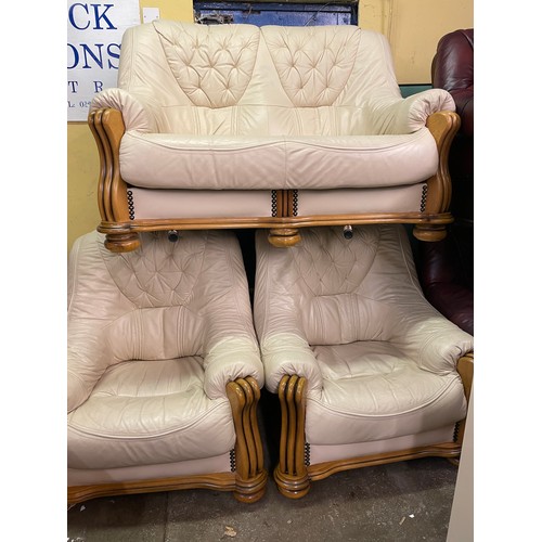 85 - CREAM LEATHER WOODEN SHOW FRAMED TWO SEATER THREE PIECE SUITE