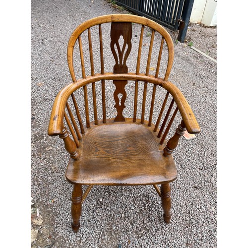 86 - 19TH CENTURY ELM AND YEW WINDSOR ARMCHAIR WITH CRINOLINE STRETCHER