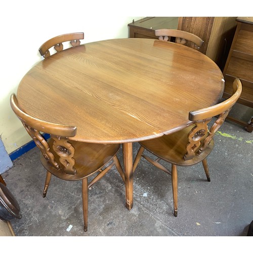 199 - ERCOL DROP FLAP DINING TABLE AND FOUR PRINCE OF WALES PLUME BAR BACK CHAIRS