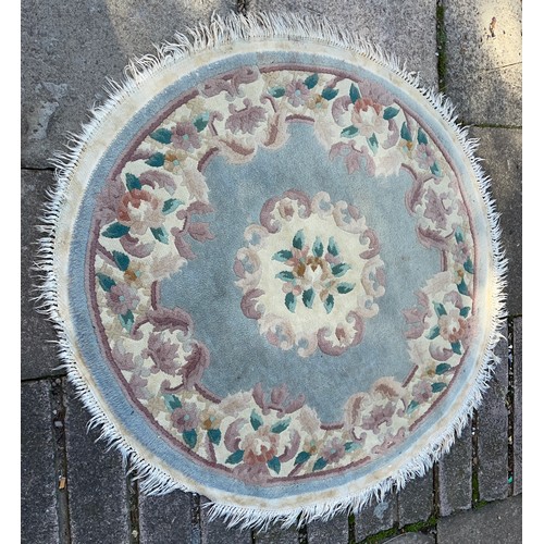 103 - TWO WASH WOOLEN RUGS 125CM DIAMETER