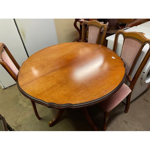 129 - CHERRY WOOD PEDESTAL EXTENDING DINING TABLE AND FOUR CHAIRS, AND SIDEBOARD