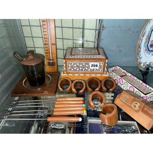 259 - DAMASCUS INSPIRED NOVELTY CIGARETTE BOX, TEAK NAPKIN RINGS, FONDUE FORKS, AND BOXWOOD THEMOMETER