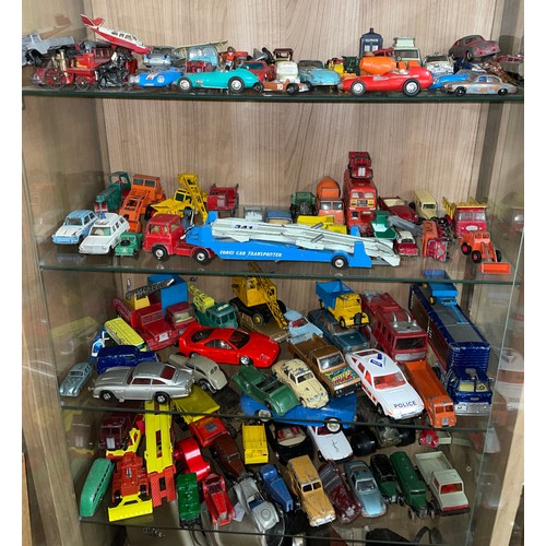 341 - FOUR SHELVES OF CORGI AND MATCHBOX DIE CAST MODEL CARS, TRANSPORTERS, COACHES, FARM MACHINERY ALL PL... 