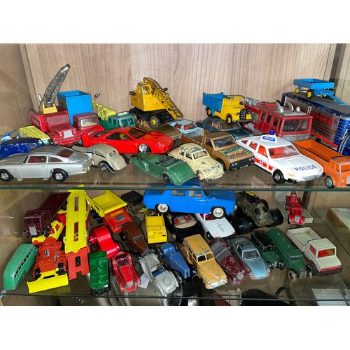 341 - FOUR SHELVES OF CORGI AND MATCHBOX DIE CAST MODEL CARS, TRANSPORTERS, COACHES, FARM MACHINERY ALL PL... 