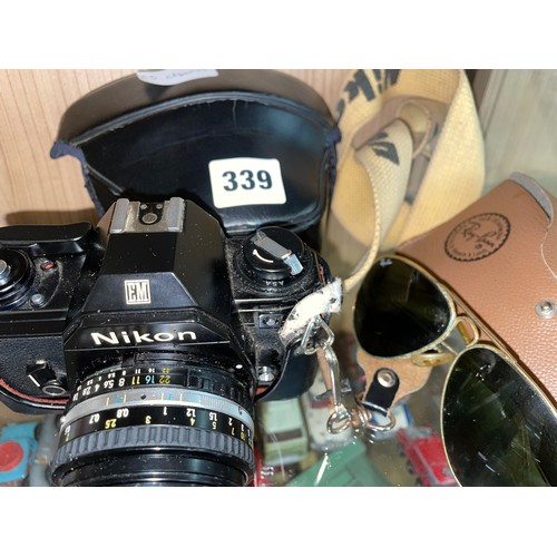 339 - NIKON 35M CAMERA, AND PAIR OF SUNGLASSES