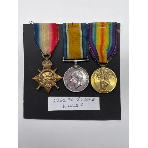 411 - MILITARY MONS STAR 1914 TRIO MEDAL GROUP 2362 PTE J.COOKE R.WAR:R AND 265475 IN CASE