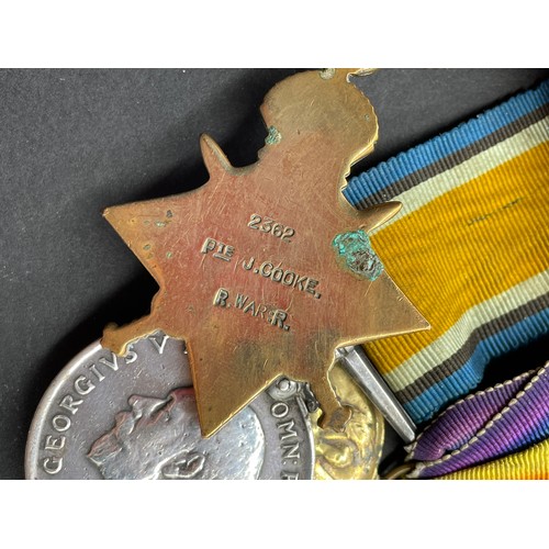 411 - MILITARY MONS STAR 1914 TRIO MEDAL GROUP 2362 PTE J.COOKE R.WAR:R AND 265475 IN CASE