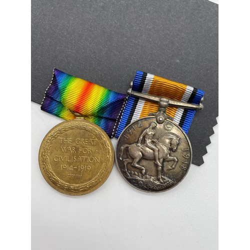 443 - WWI MEDAL DUO 1677 PTE G. PEACE R.WAR.R