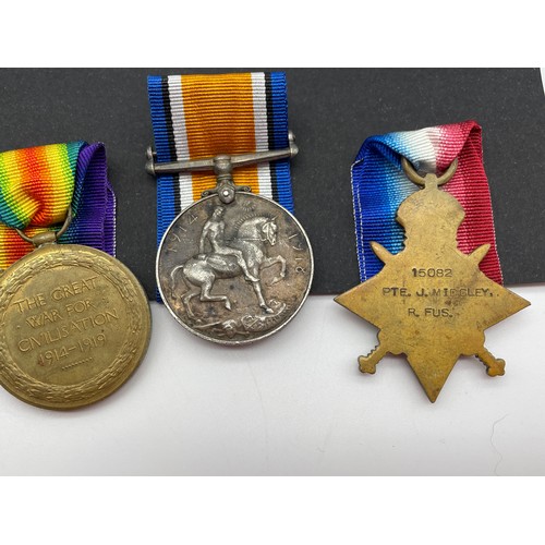 422 - WWI MEDAL TRIO PTE J. MIDGLEY 15082 ROYAL FUS AND 70739R DEFENCE C