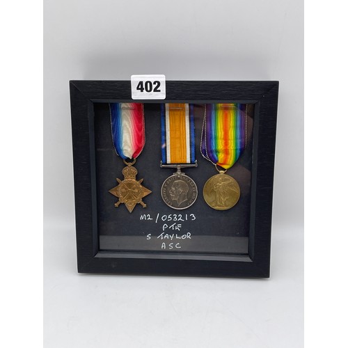 402 - MILITARY MONS STAR 1914 TRIO MEDAL GROUP M2/053213 PTE S TAYLOR A.S.C IN CASE