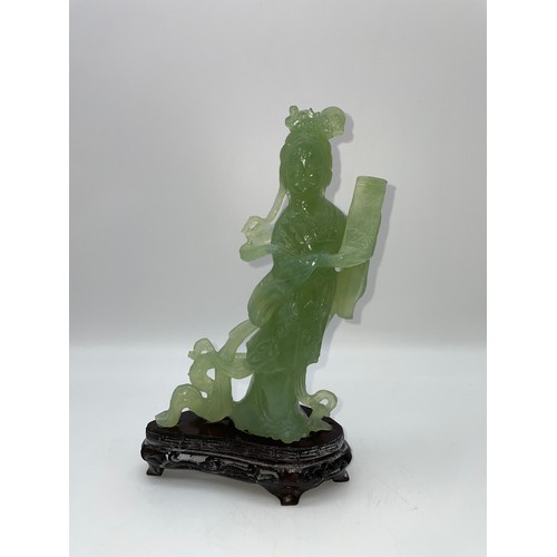 502 - CHINESE JADEITE FIGURE OF A GUAYIN ON A HARDWOOD BASE