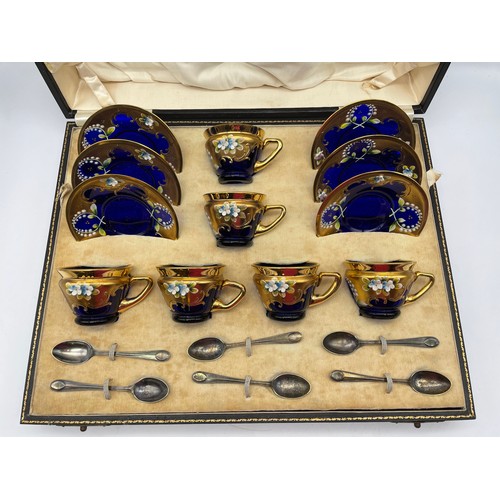 493 - BOXED SIX PIECE TREFUOCHI MURANO SAPPHIRE GLASS COFFEE SET WITH SIX SILVER SPOONS