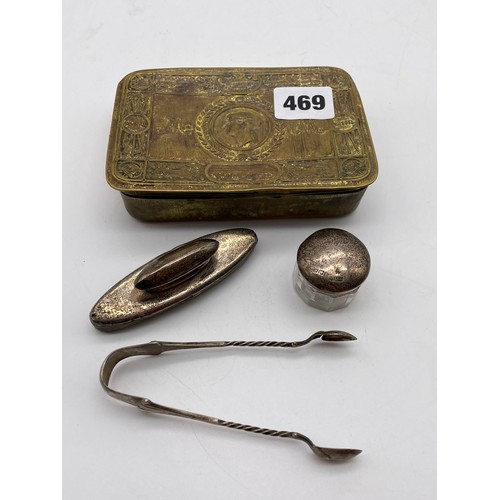 469 - SILVER TOPPED ROUGE POT, SILVER MOUNTED NAIL BUFFER, PAIR OF SILVER SUGAR TONGS, WITHIN A WWI CHRIST... 