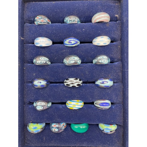 472 - TRAY OF GLASS RINGS