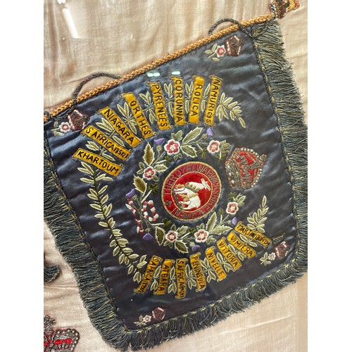 400 - EMBROIDERED NEEDLE WORK PANEL FOR THE ROYAL WARWICKSHIRE REGIMENT WITH EMBLEM FLAGS AND COLOURS FRAM... 