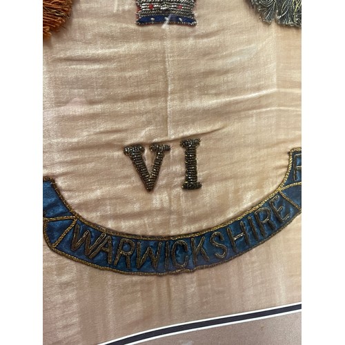 400 - EMBROIDERED NEEDLE WORK PANEL FOR THE ROYAL WARWICKSHIRE REGIMENT WITH EMBLEM FLAGS AND COLOURS FRAM... 