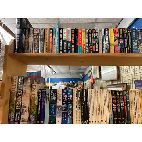 519 - THREE SHELVES OF HARDBACK AND MAINLY PAPER BACK SCIENCE FICTION AND FANTASY NOVELS INCLUDING ALAN DE... 