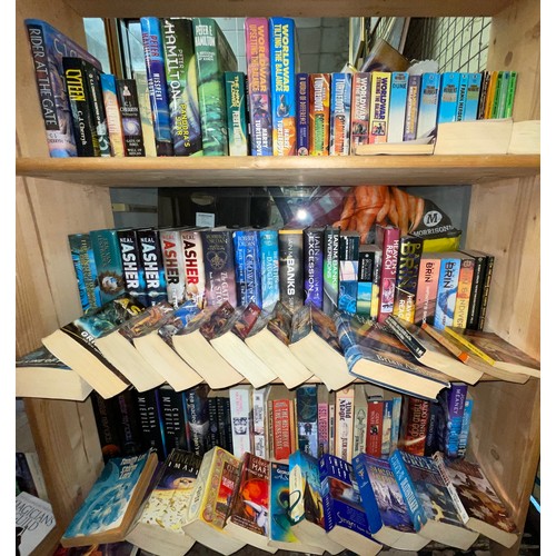 520 - THREE SHELVES OF HARDBACK AND MAINLY PAPERBACK SCIENCE FICTION AND FANTASY NOVELS INCLUDING HARRY TU... 