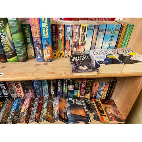 520 - THREE SHELVES OF HARDBACK AND MAINLY PAPERBACK SCIENCE FICTION AND FANTASY NOVELS INCLUDING HARRY TU... 